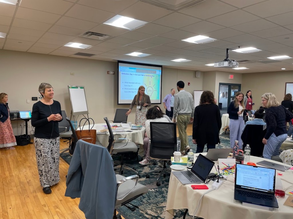 The I365 team working with the participants from the Spring 2024 ILA